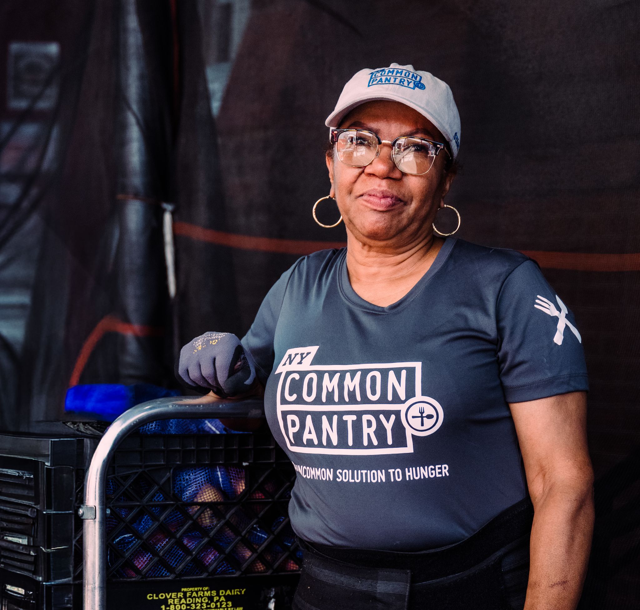 Woman by a hand cart