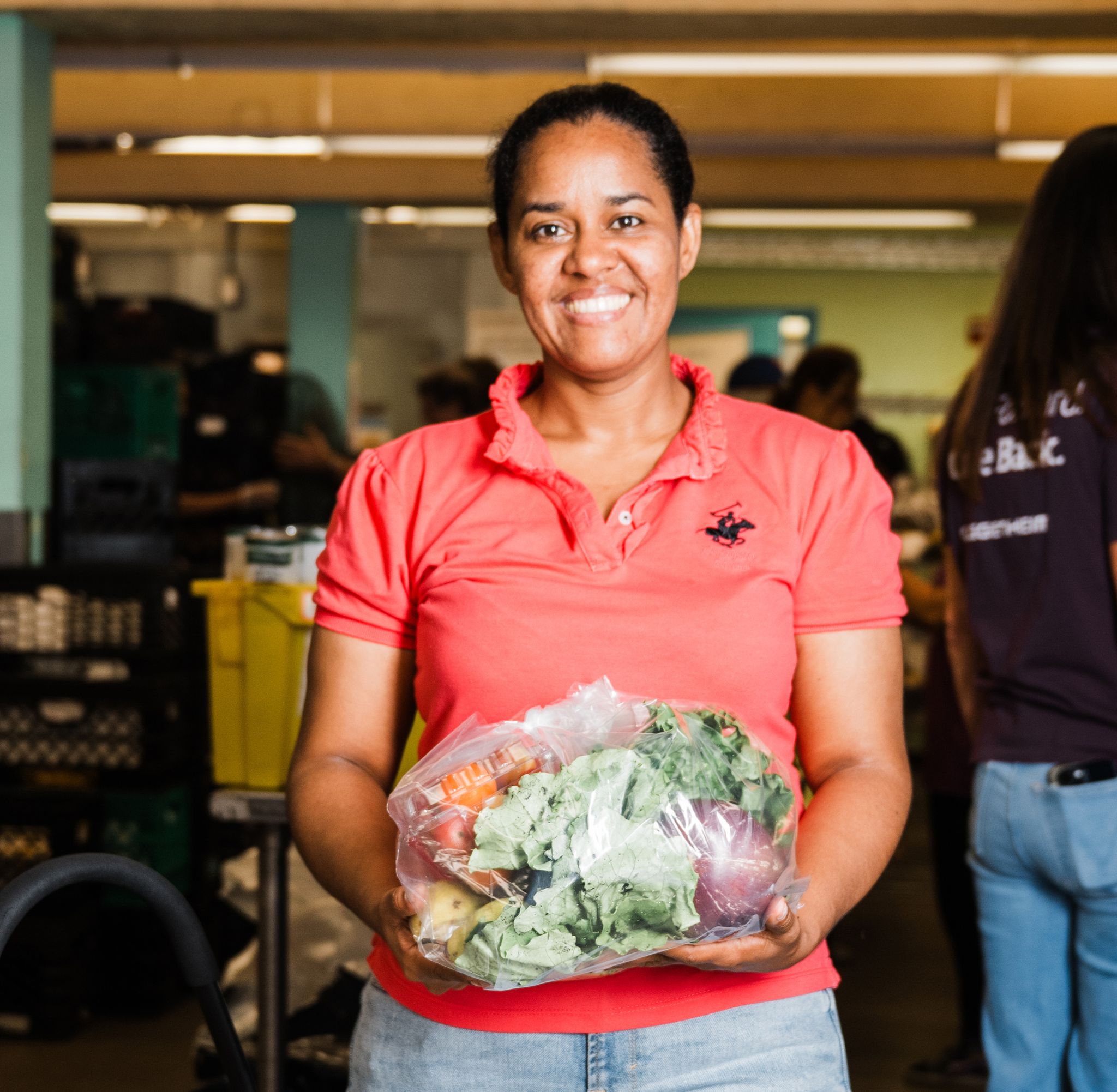 Woman standing with produce