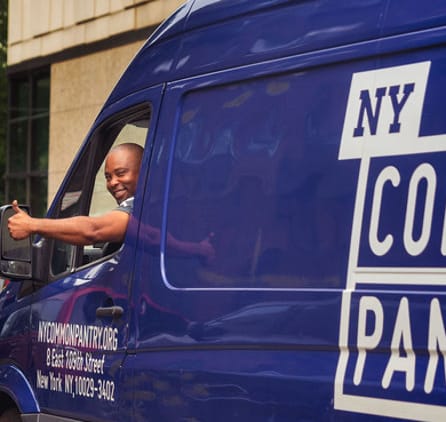 Van driver with thumbs up