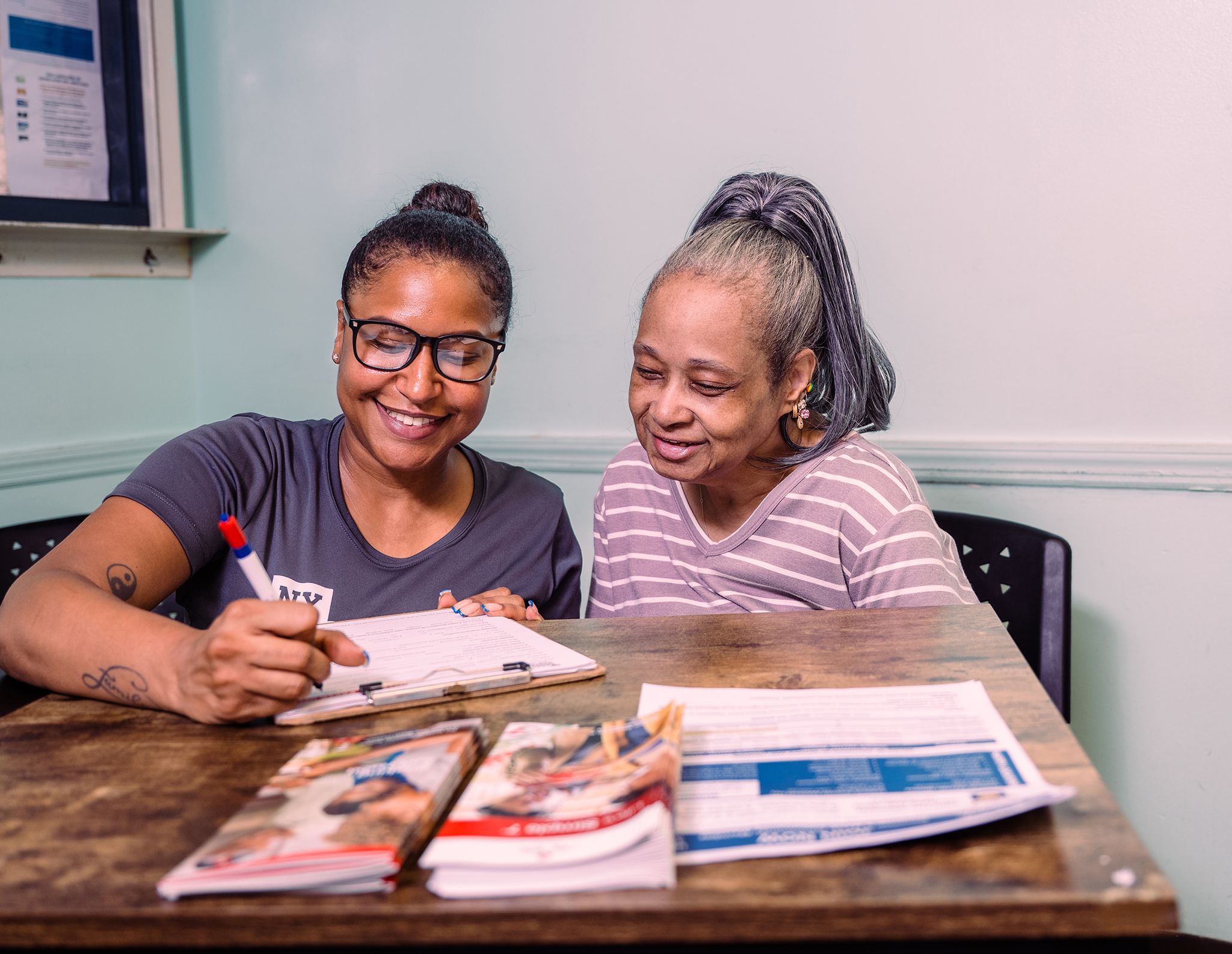 Women filling out a form