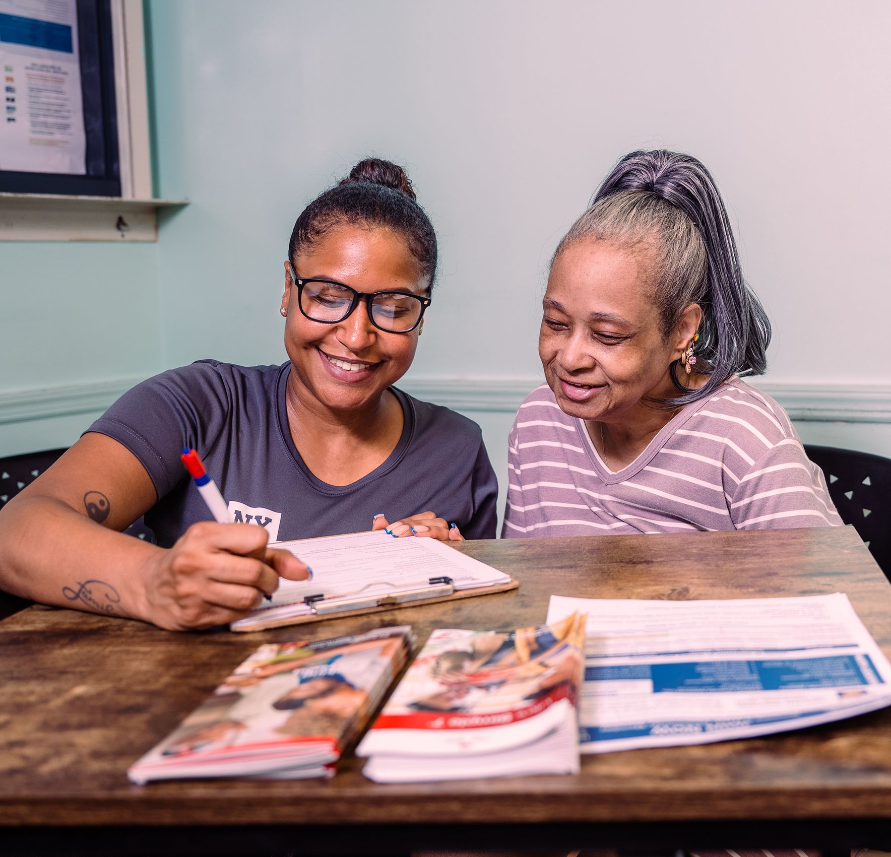 Women filling out a form