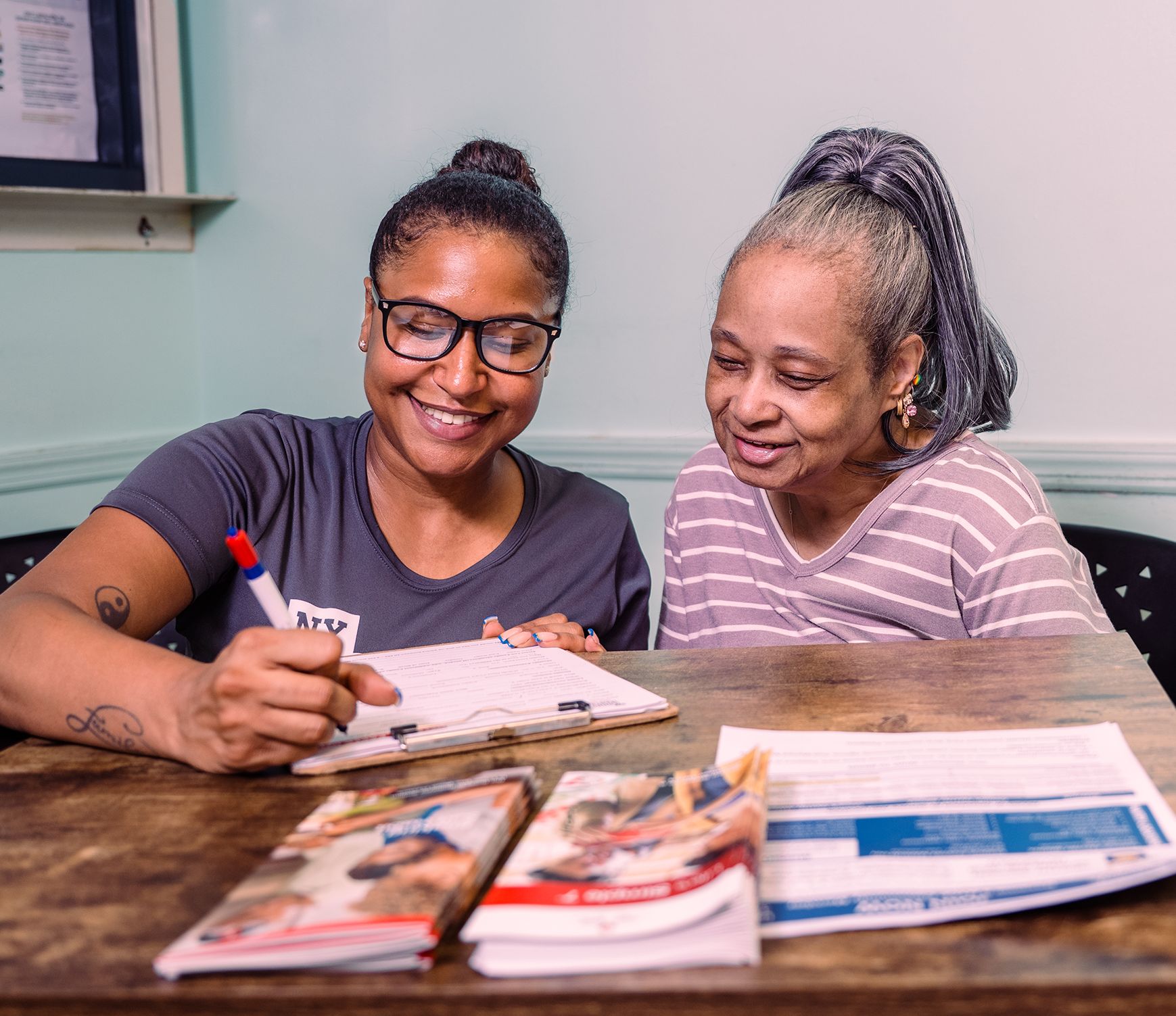 Women filling out a form